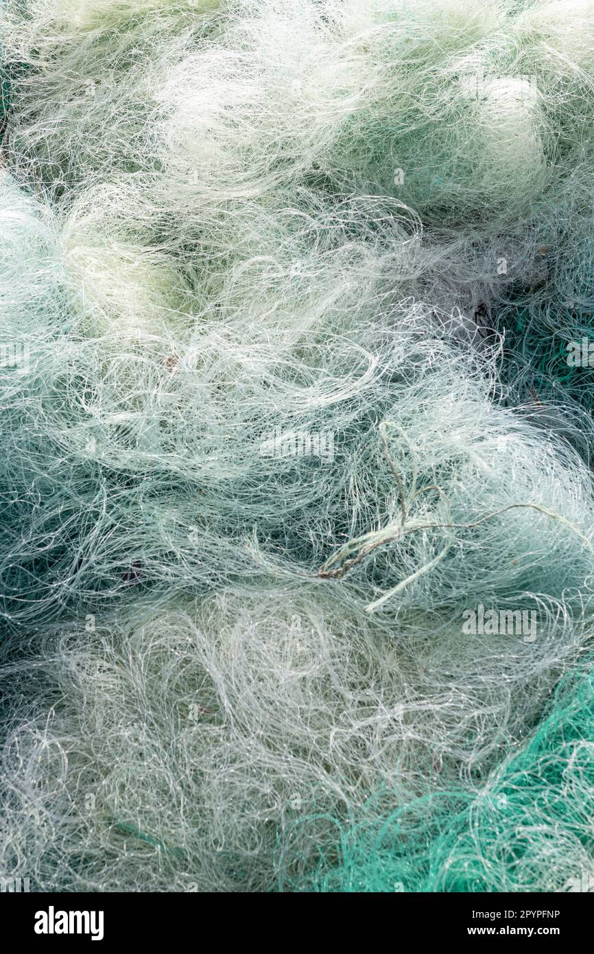 Hintergrund des verwendeten Fangnetzes. Abfälle aus der Fischereiindustrie Stockfoto