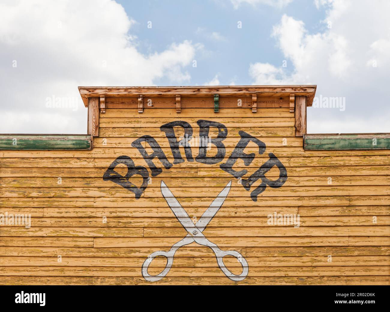 Alten Barbier Schild an einem verlassenen Gebäude Stockfoto