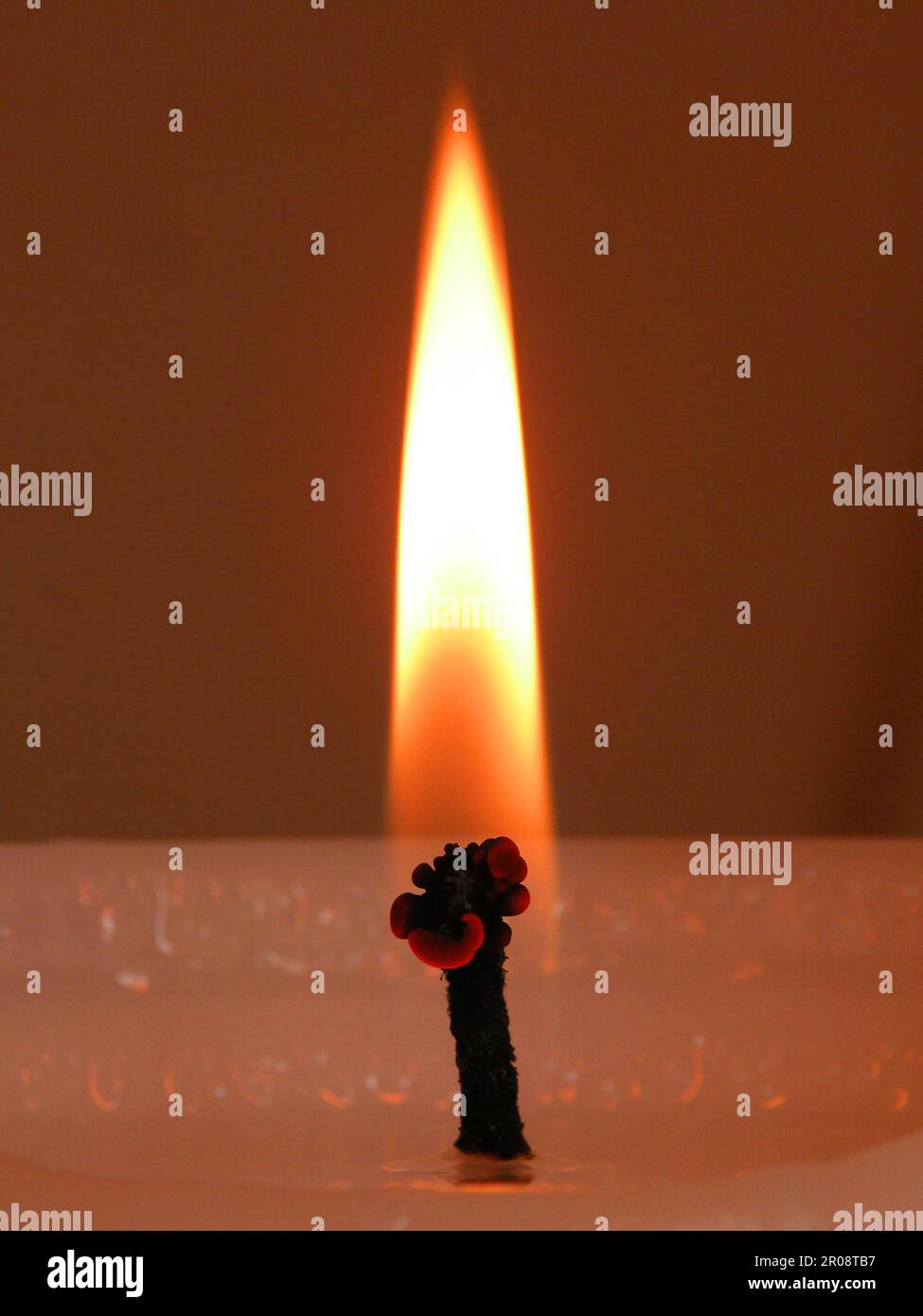 Brennende Kerze Stockfoto