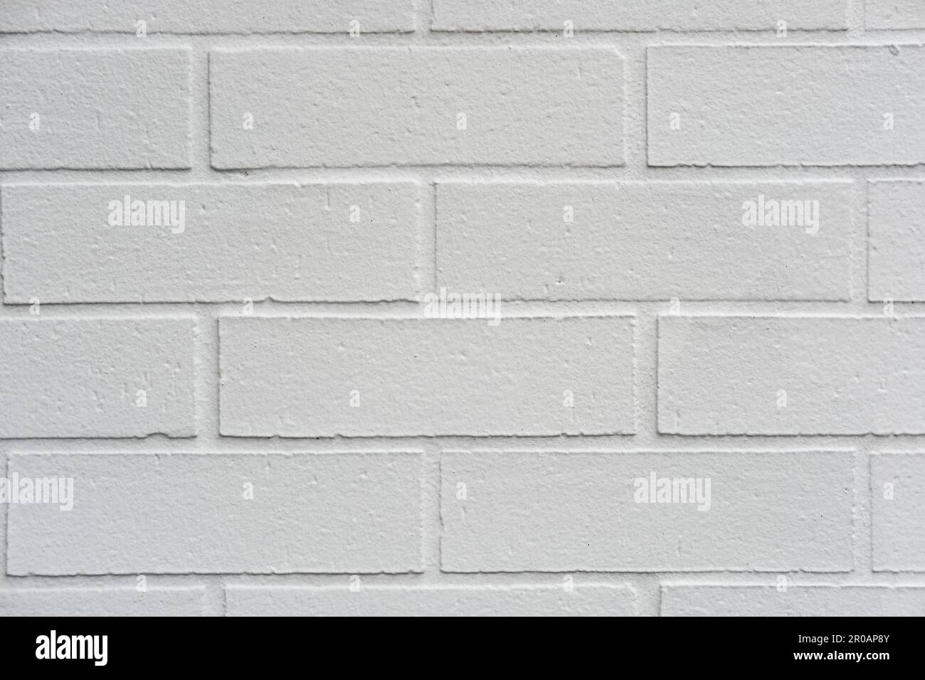 Hintergrund einer bemalten weißen Steinwand Stockfoto