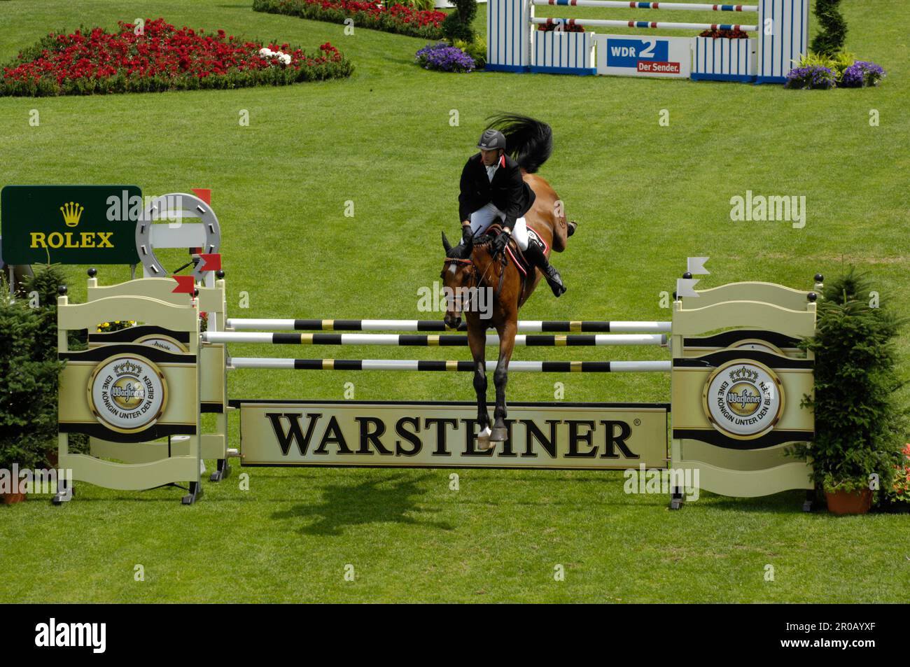 Holger Wulschner Aktion auf Clausen.Springreiten Warsteiner Preis von Europa 2.7.2008 Stockfoto