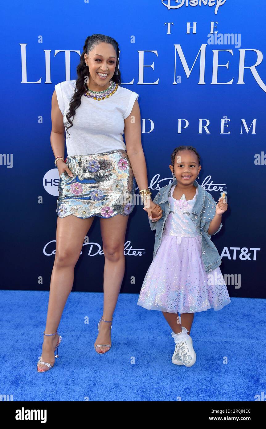Tia Mowry, left, and daughter Cairo Tiahna Hardrict arrive at the world
