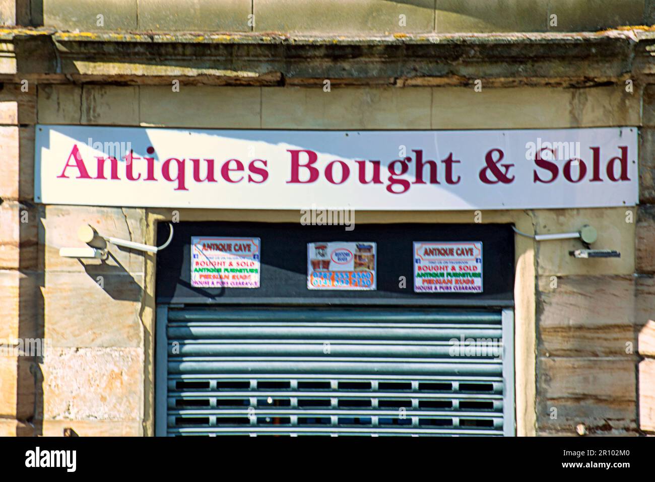 Antiquitätenladen-Banner gekauft und verkauft Stockfoto