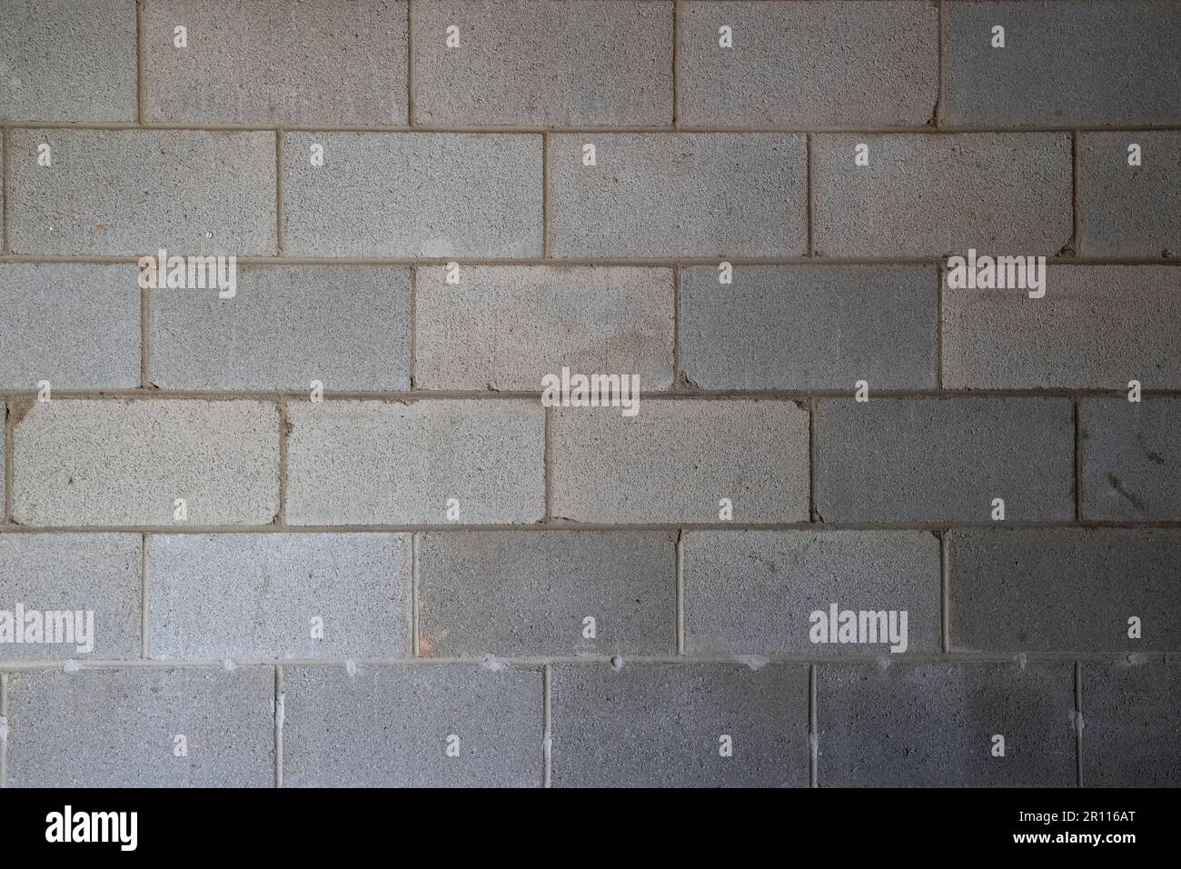 Graue Betonblockwand, grau, Struktur, Begrenzung Stockfoto