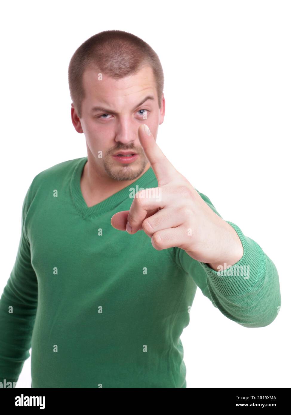 harter Kerl bedrohliche Geste seine Finger wit Stockfoto