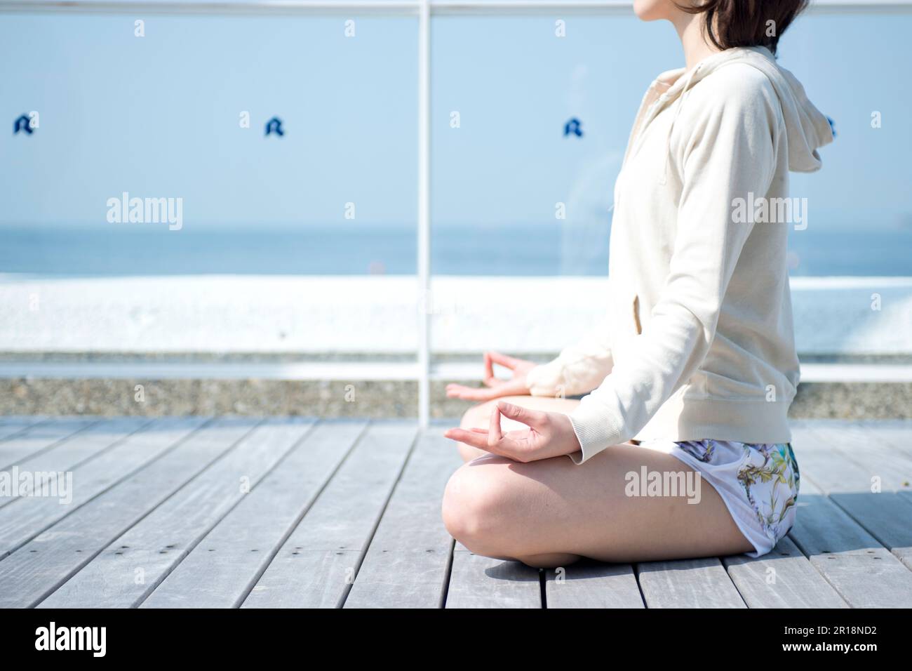 Eine Frau beim yoga Stockfoto