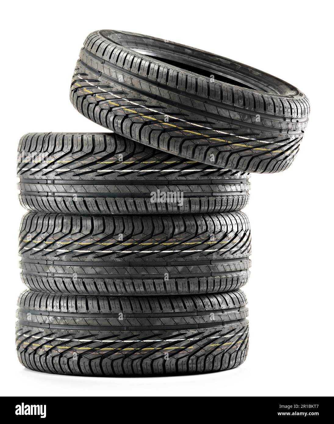 Vier neue schwarze Reifen isoliert auf weißem Hintergrund Stockfoto