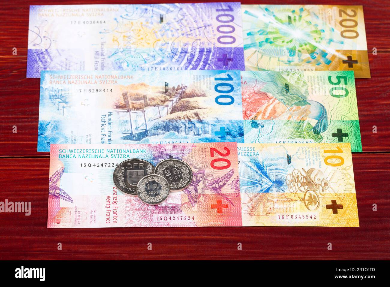 Schweizer Geld - Franken - Münzen und Banknoten Stockfoto