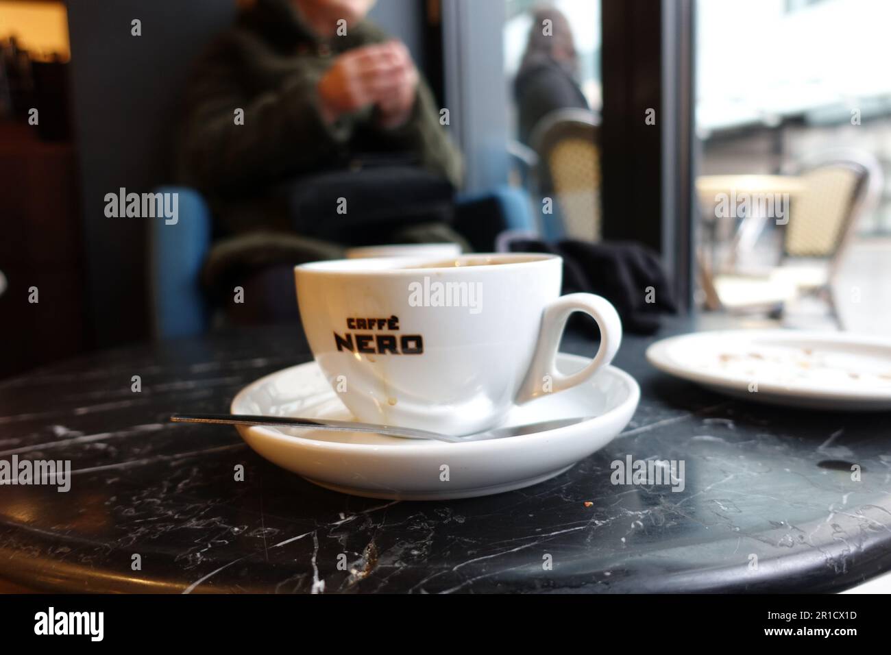 Nahaufnahme Café Nero Kaffeetasse London UK Stockfoto