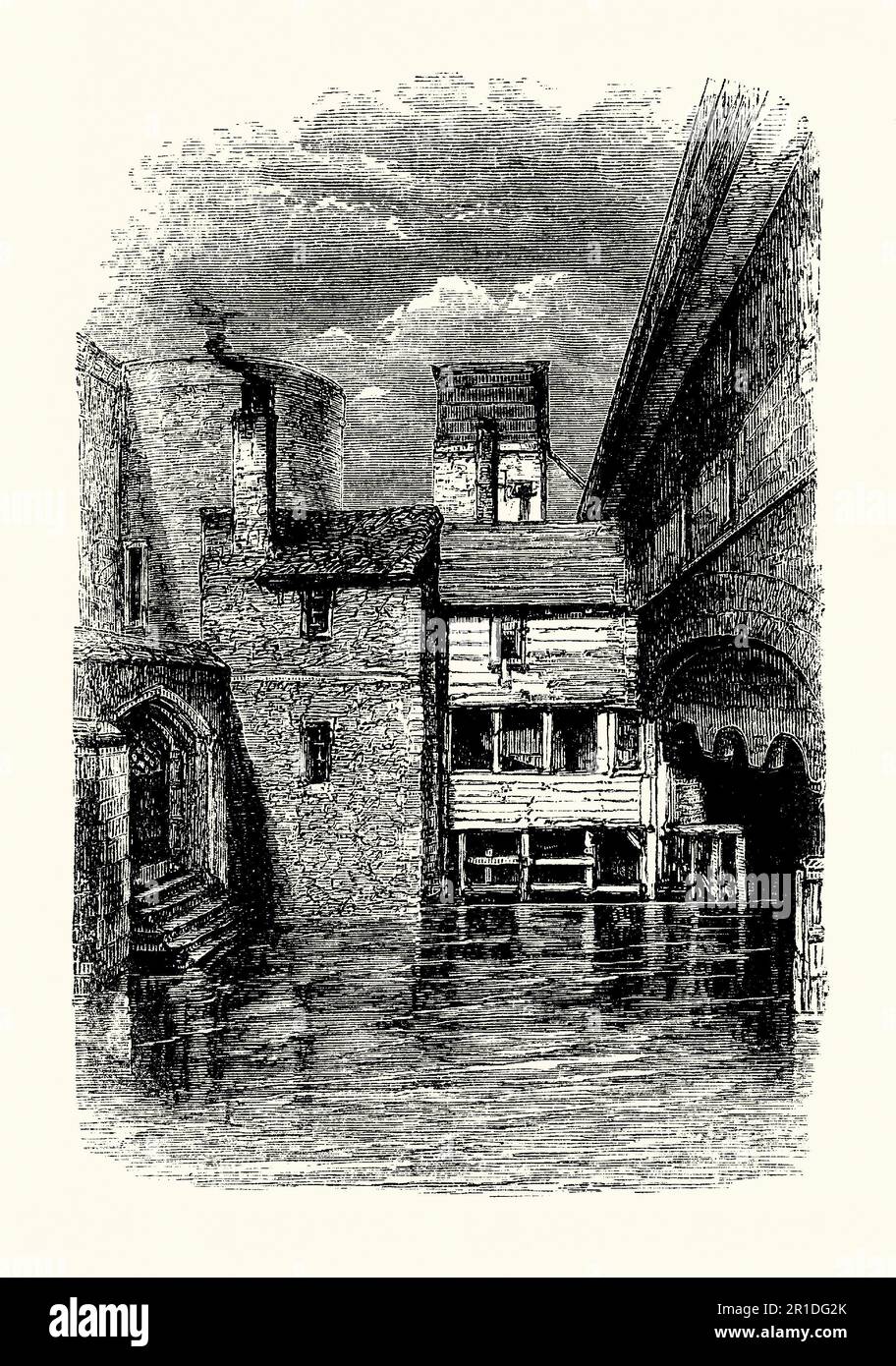 Eine alte Gravur des Verrätertors Gate, The Tower of London, London, England, UK c. 1550. Der Tower wurde Ende 1066 im Rahmen der normannischen Eroberung von England gegründet. Es war eine königliche Residenz. Das Verrätertor ist ein Eingang, durch den viele Häftlinge der Tudors am Tower of London (hier auf der rechten Seite) eintrafen. Das Tor wurde von Edward I gebaut, um einen Bootseingang zum St. Thomas' Tower (links) zu bieten, der zusätzliche Unterkünfte für die königliche Familie bereitstellte. Gefangene wurden mit einem Schiff entlang der Themse gebracht. Stockfoto