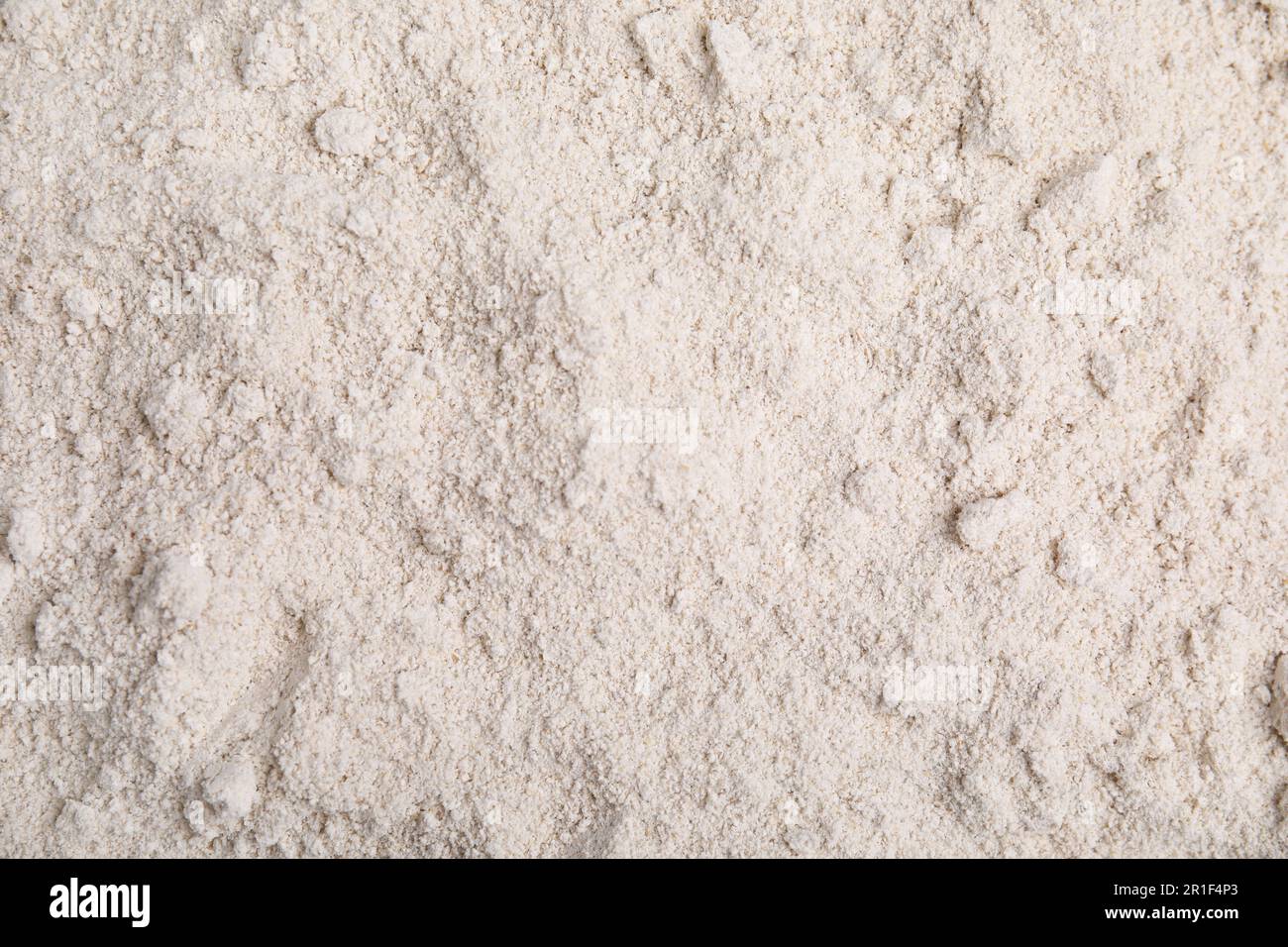 Haufen Hafermehl als Hintergrund, Draufsicht Stockfoto