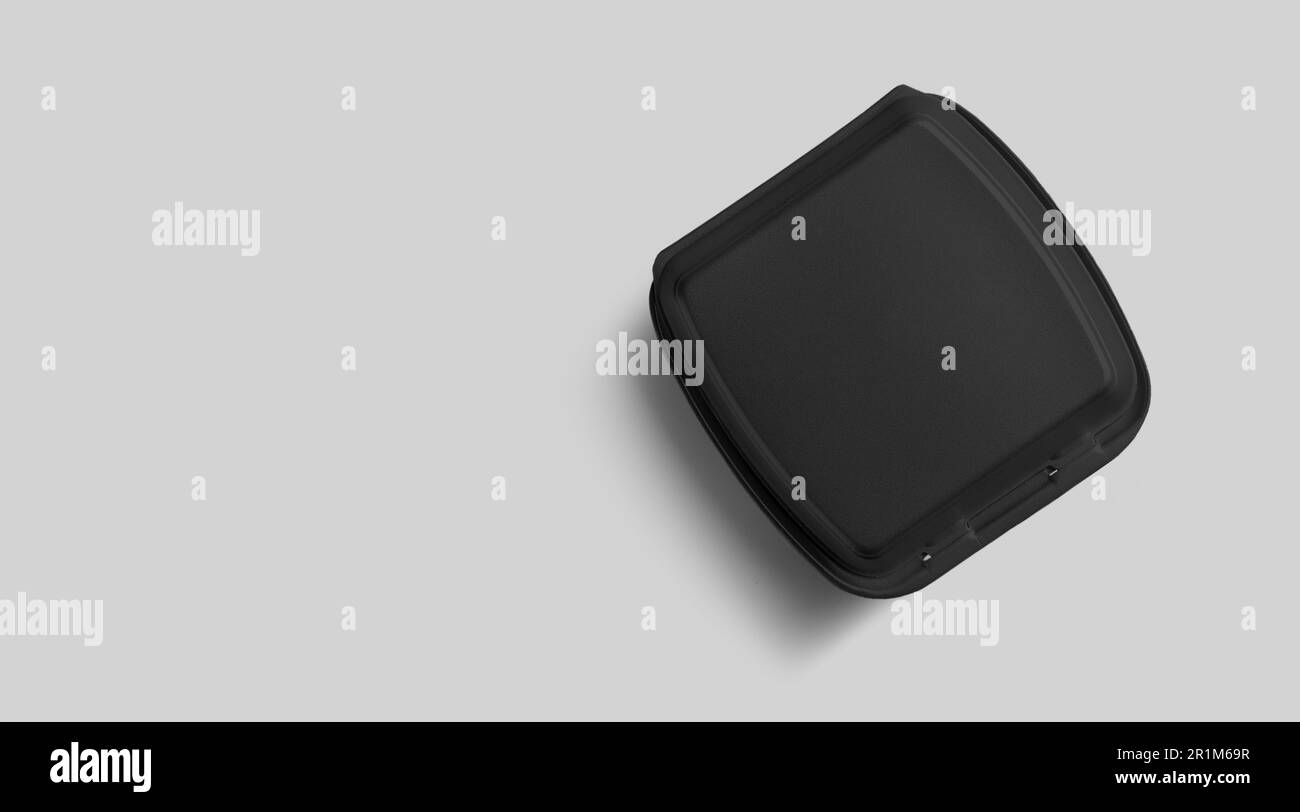 Nachfüllansicht von schwarzem Styropor isoliert auf grau. Umweltfreundliches Mittagskonzept. Stockfoto