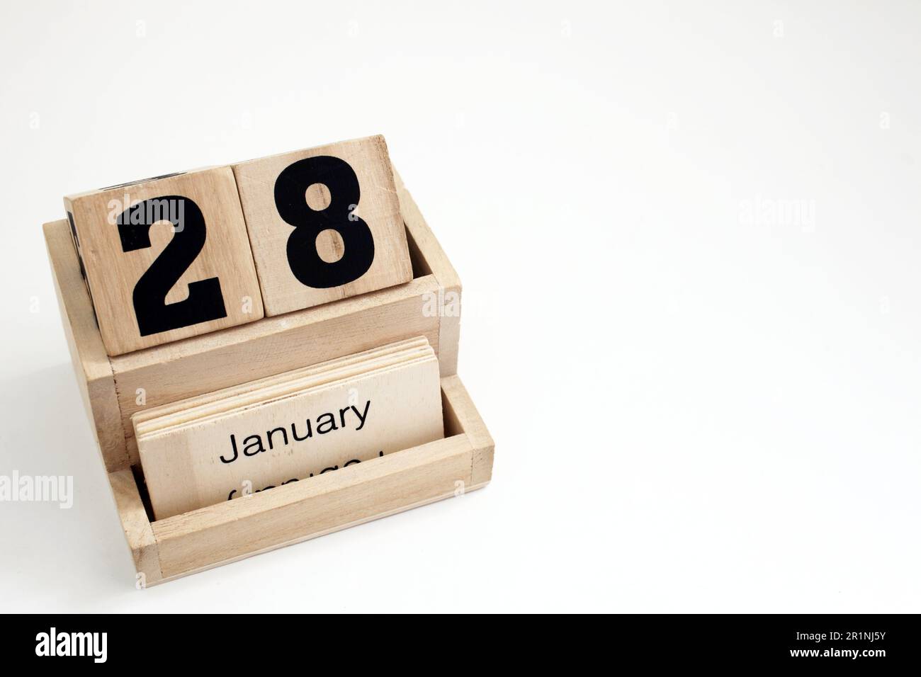 Hölzerne ewige Kalenderblöcke für Januar Stockfoto