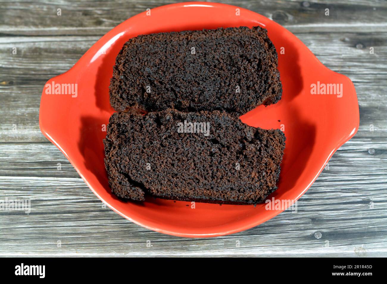 Schokoladenkuchenmischung, köstliche hausgemachte Kuchen, reichhaltige Proteinquelle, Kohlenhydrate, Zucker, Energie, aromatische Leckereien für Gelegenheiten, verpackt in Food-Gra Stockfoto