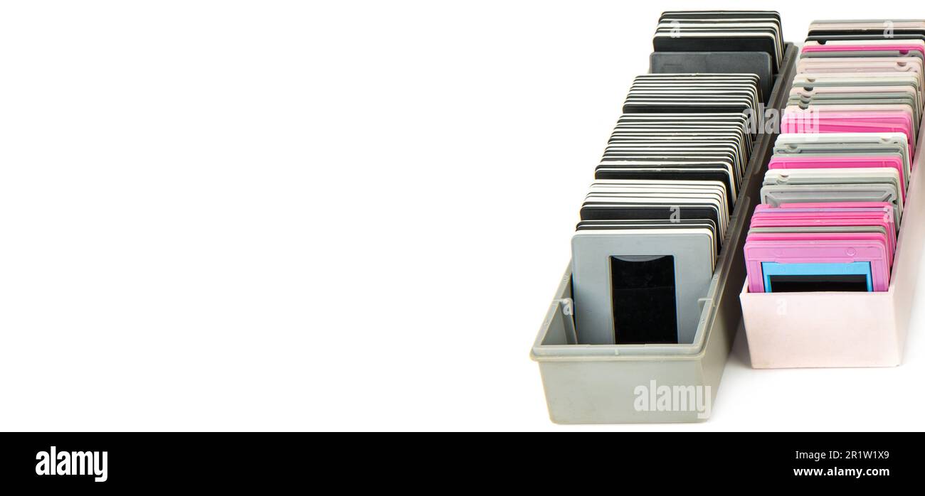 Fotofolien in einer Box, isoliert auf weißem Hintergrund. Breites Foto. Es ist Platz für Text vorhanden. Stockfoto