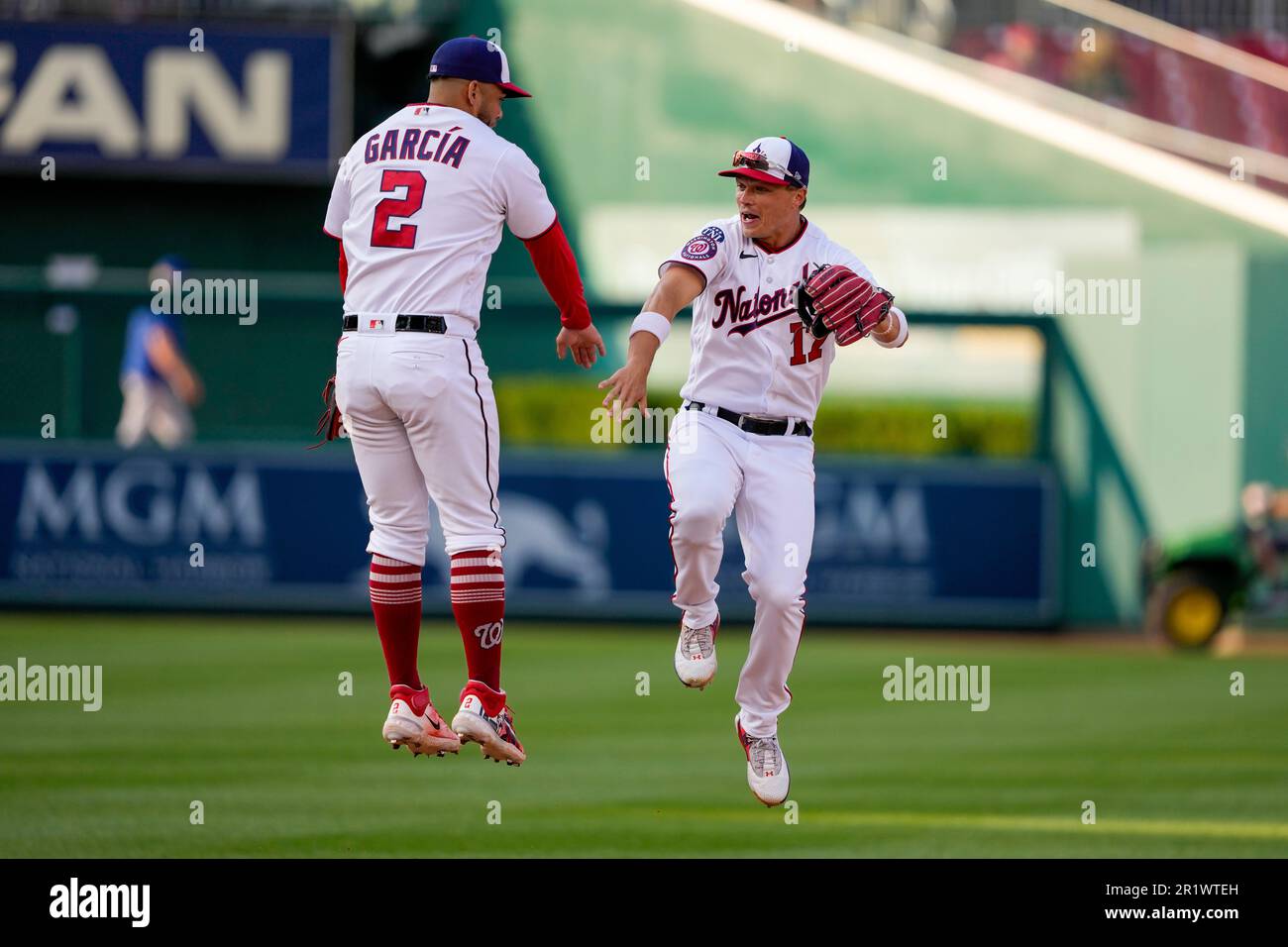 Washington Nationals second baseman Luis Garcia and center fielder Alex Call celebrate after a baseball game against the New York Mets at Nationals Park, Monday, May 15, 2023, in Washington. (AP Photo/Alex Brandon) Stockfoto