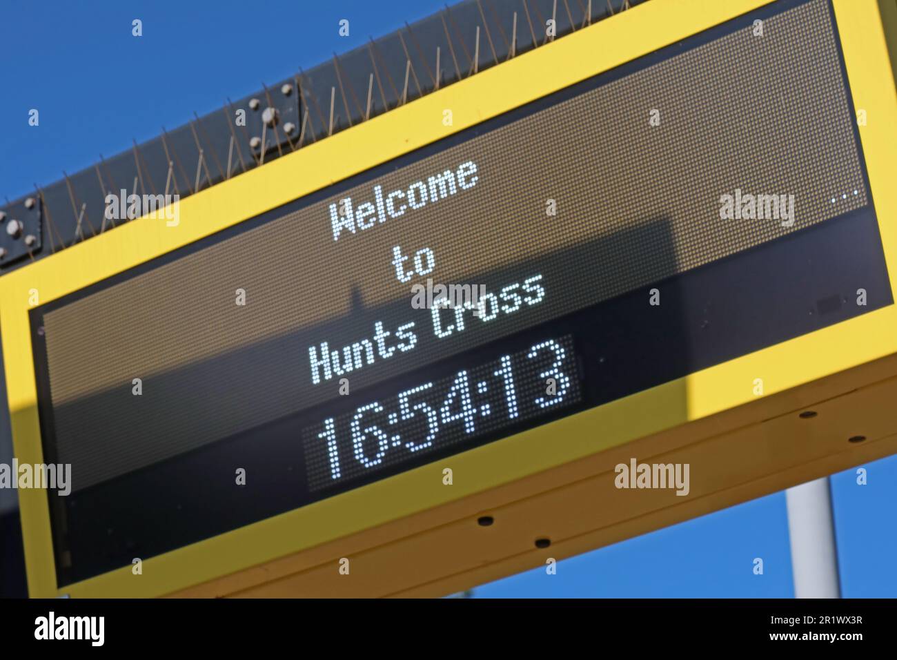 Begrüßungsschild, Hunts Cross, Merseyrail Bahnhof, HNX, Speke Rd, Woolton, Liverpool, Merseyside, England, Großbritannien, L25 0NN Stockfoto