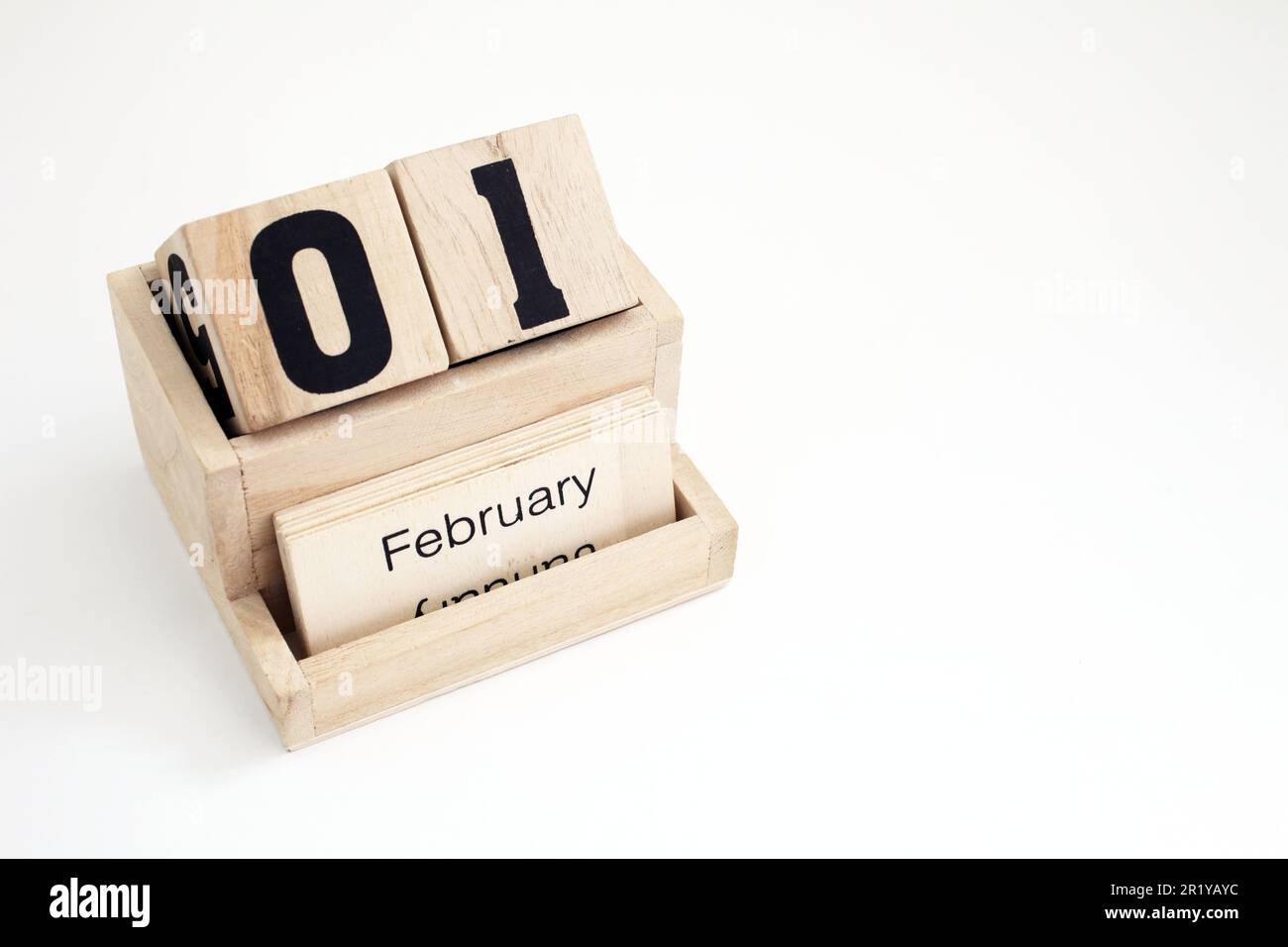 Ewiger Kalender aus Holz, der den 1. Februar zeigt Stockfoto