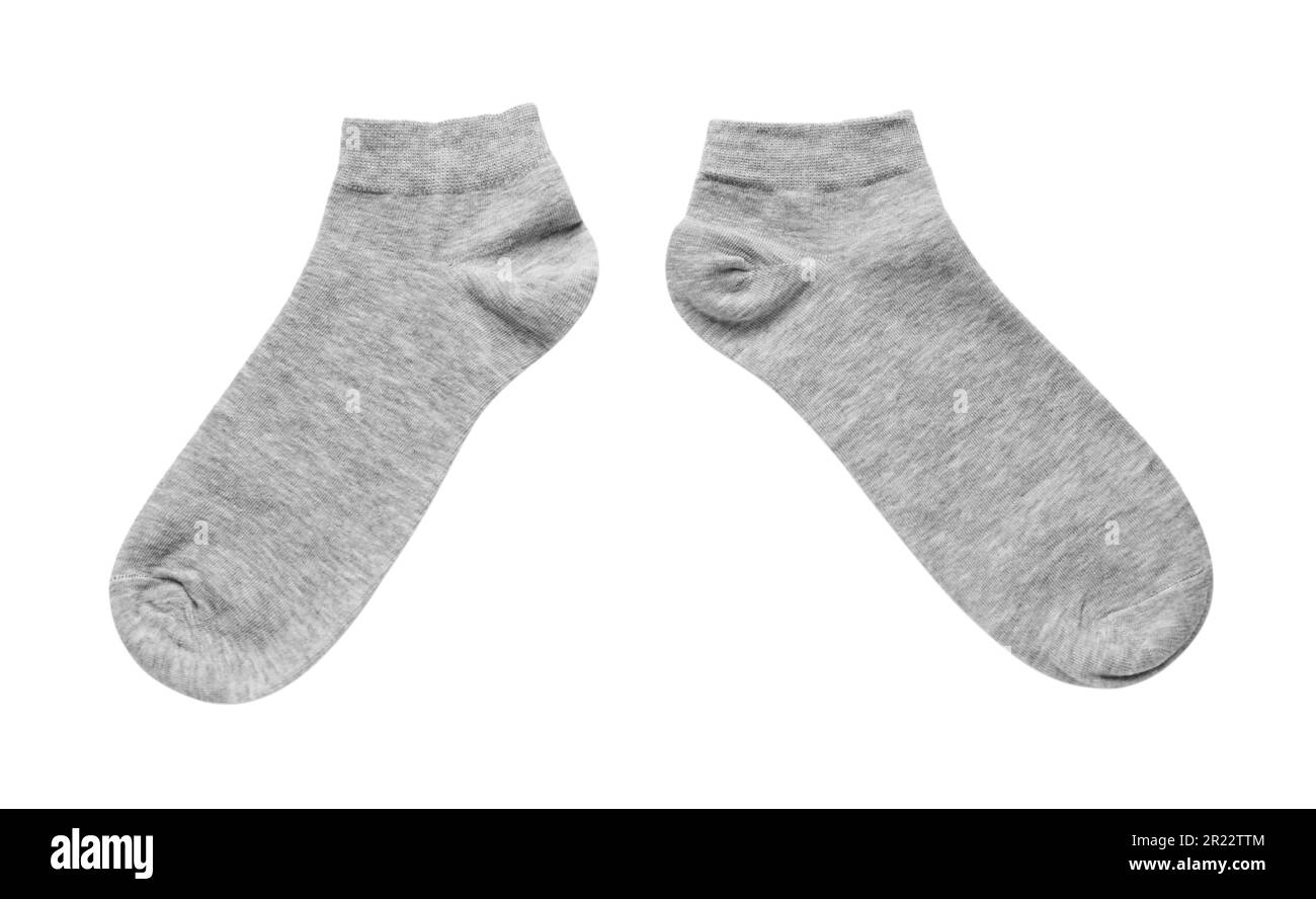 Graue Socken auf weißem Hintergrund, Draufsicht Stockfoto