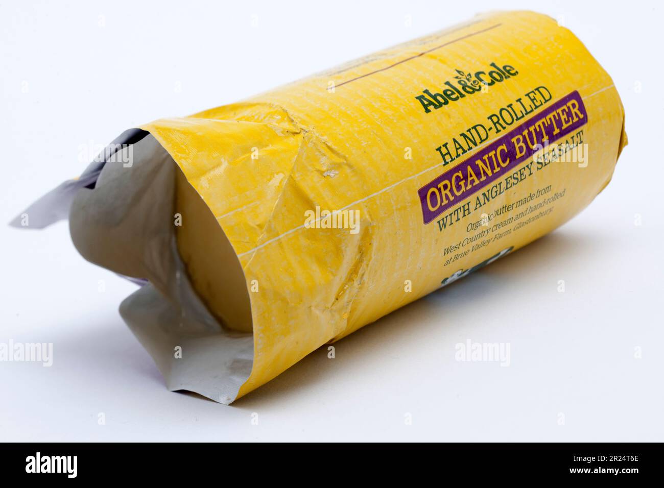 Abel und Cole handgerollte Bio-Butter. Stockfoto