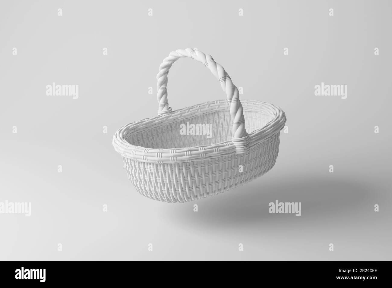 Korb aus Korb mit weißem Hintergrund und Schatten für ein einfarbiges Design. Veranschaulichung des Konzepts von Minimalismus und Picknick Stockfoto