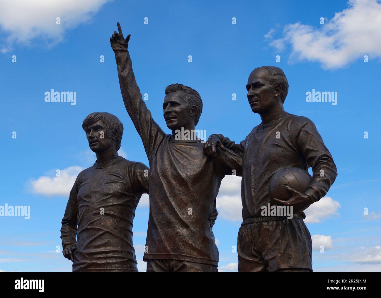 Holy Trinity Statue vor dem Manchester United's Stadium, Old Trafford, Manchester, Großbritannien Stockfoto