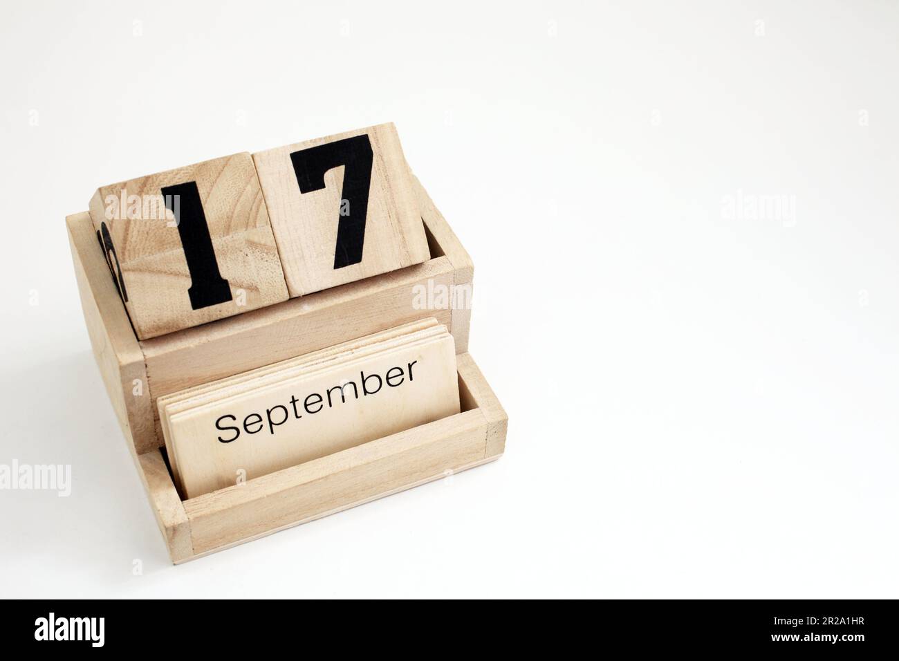 Ewiger Kalender aus Holz, der den 17. September zeigt Stockfoto