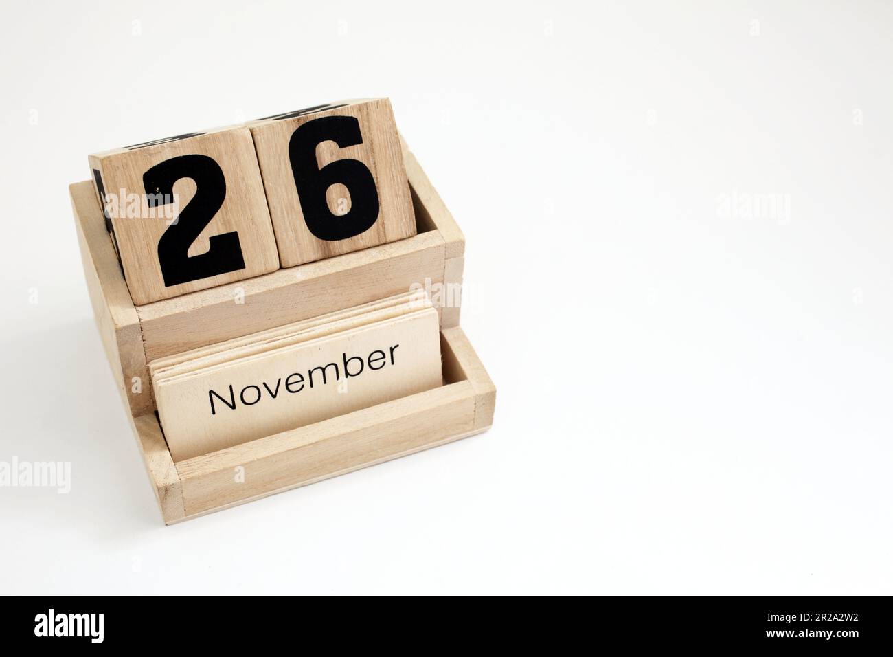 Ewiger Kalender aus Holz, der den 26. November zeigt Stockfoto