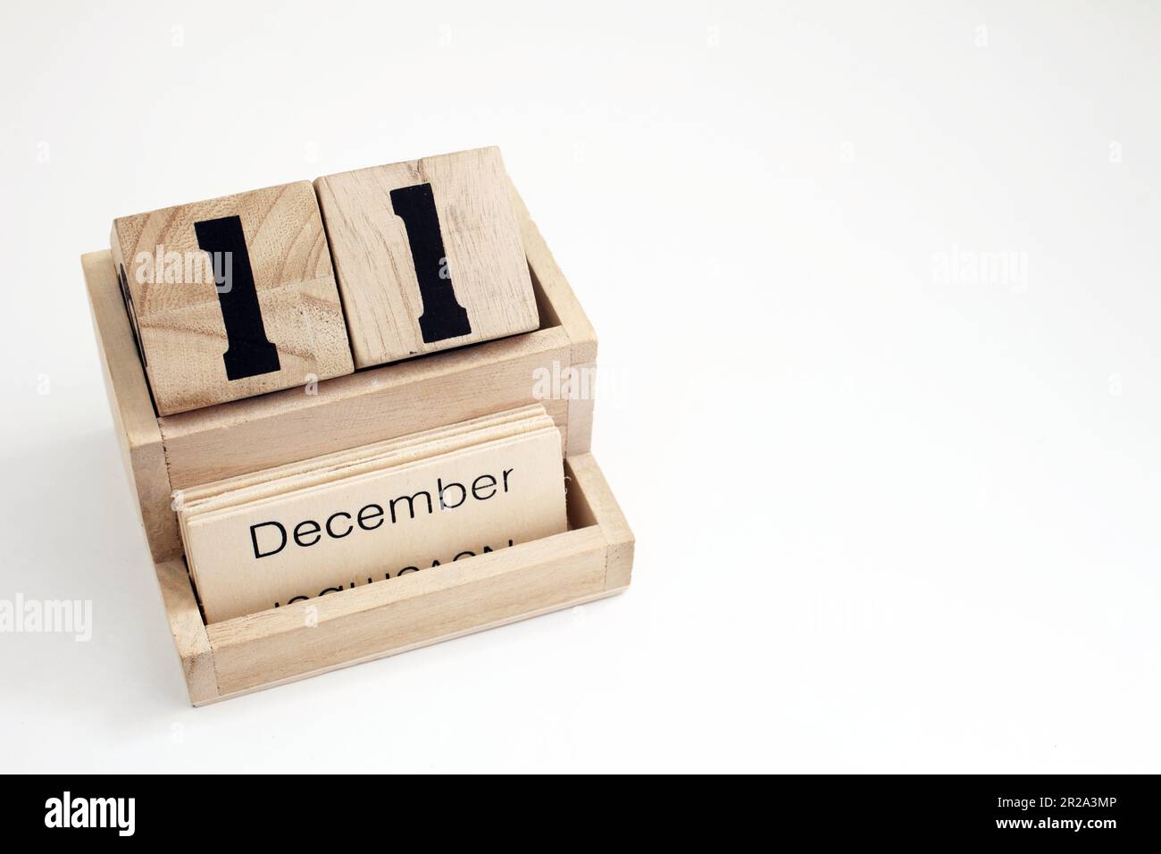 Ewiger Kalender aus Holz mit dem 11. Dezember Stockfoto