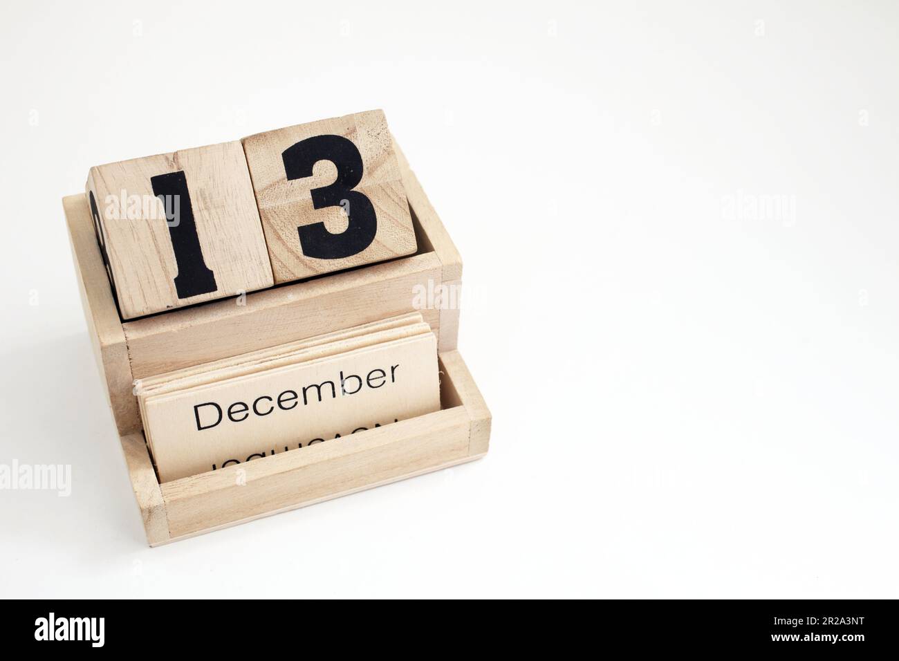Ewiger Kalender aus Holz mit dem 13. Dezember Stockfoto