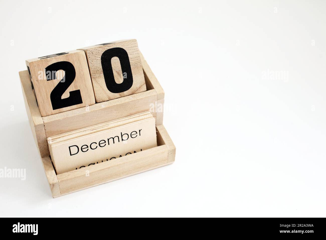 Ewiger Kalender aus Holz mit dem 20. Dezember Stockfoto