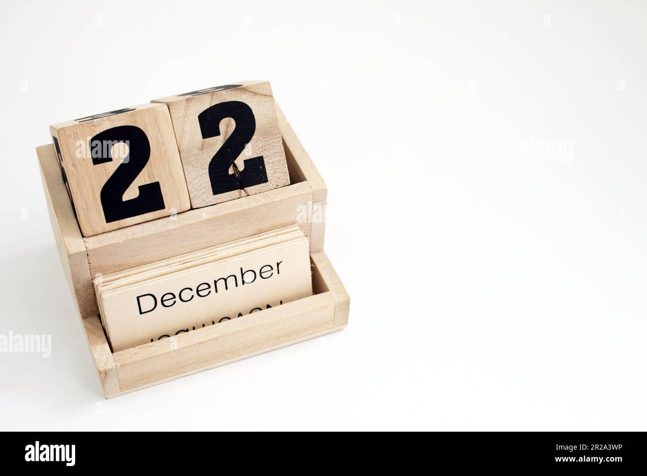 Ewiger Kalender aus Holz mit dem 22. Dezember Stockfoto