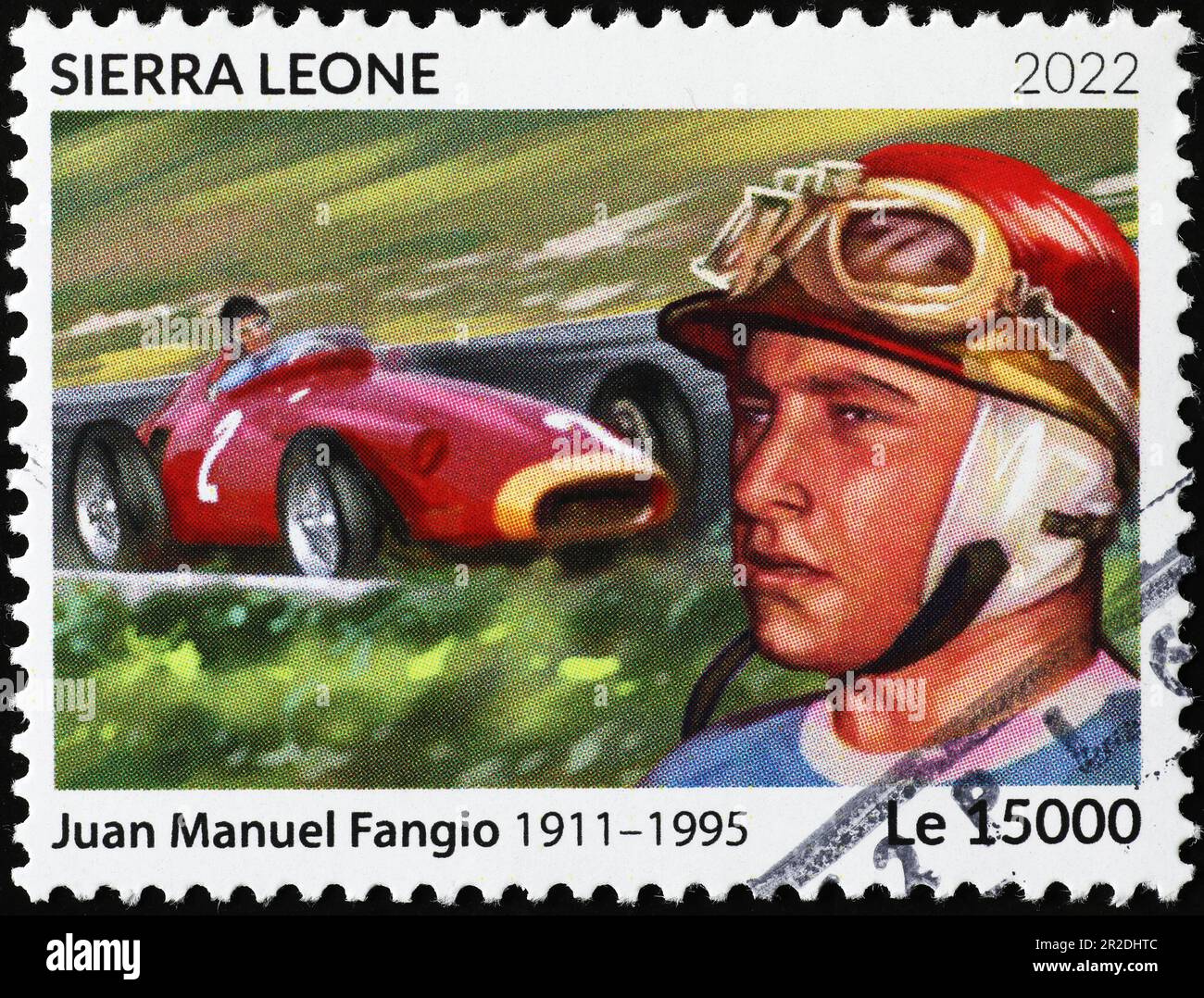 Juan Manuel Fangio und sein Auto auf afrikanischer Briefmarke Stockfoto