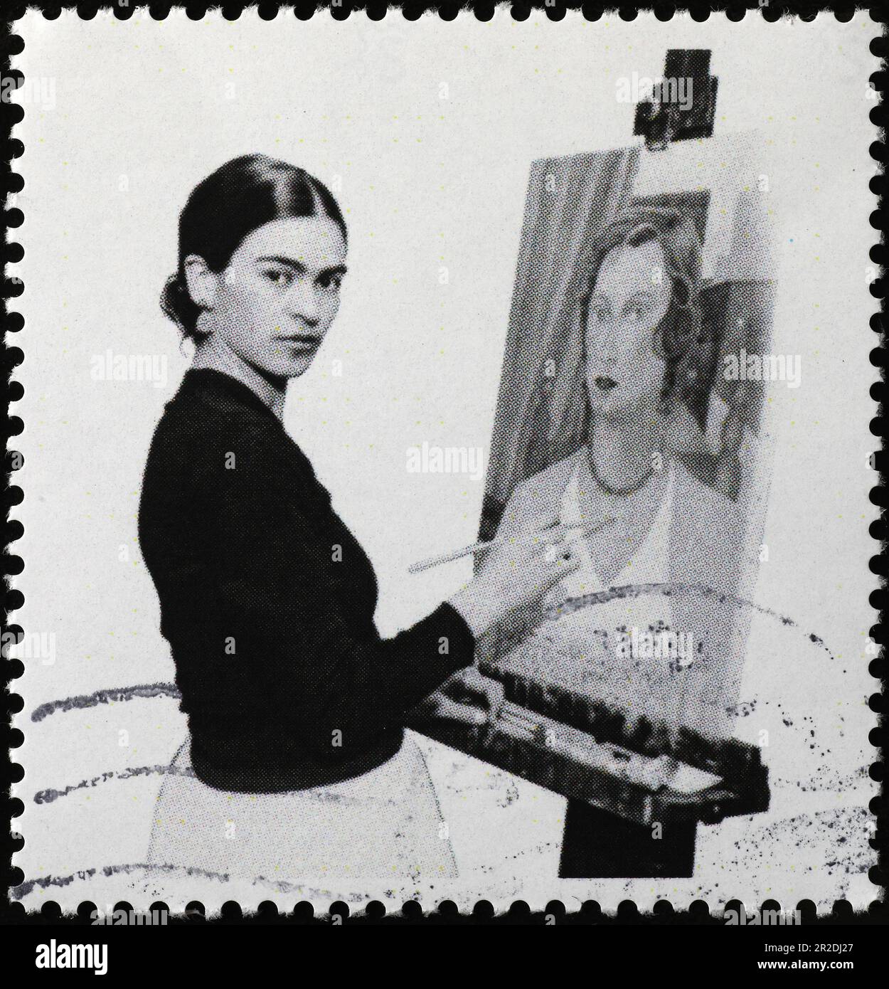 Fotografie von Frida Kahlo bei der Arbeit an Briefmarken Stockfoto