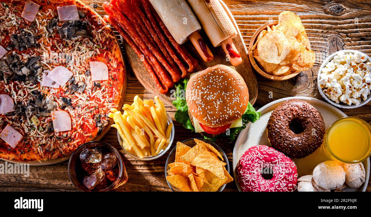 Lebensmittel, die das Krebsrisiko erhöhen. Junk Food Stockfoto