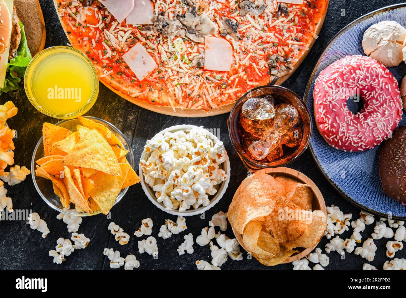 Lebensmittel, die das Krebsrisiko erhöhen. Junk Food Stockfoto