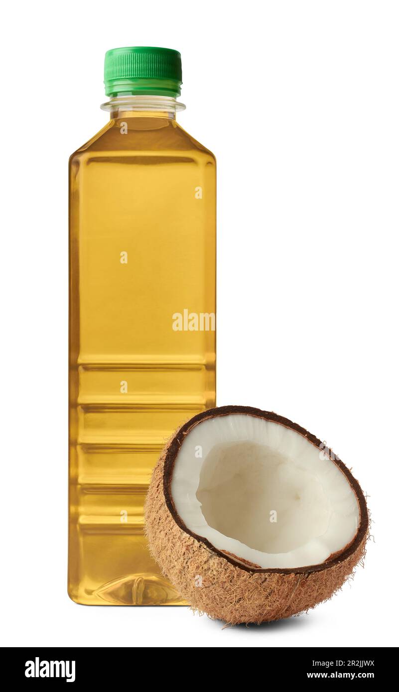 Flasche Kokosnussöl mit Kokosnussfrucht auf weißem Hintergrund isoliert, vielseitiges Öl aus reifen Früchten, zum Kochen verwendet, medizinische Zwecke Stockfoto