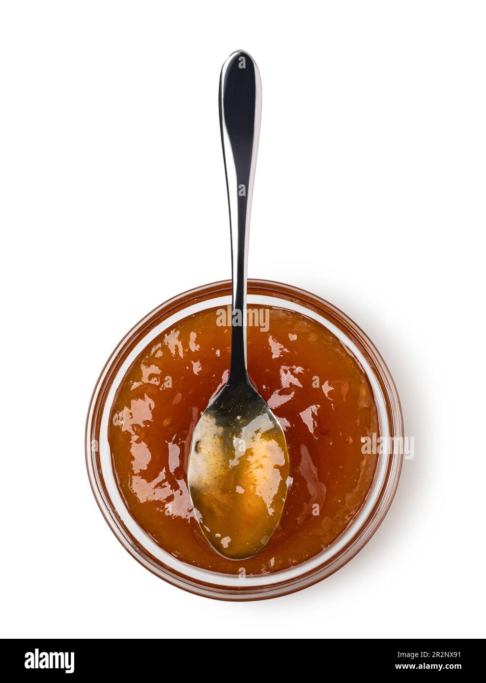 Löffel auf die Untertasse mit isolierter Marmelade auf Weiß Stockfoto