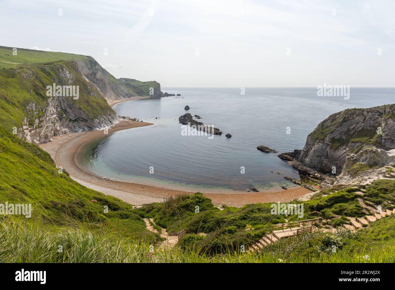 Man O' war Bay ist eine geschlossene Bucht in der Nähe von Durdle Door entlang der Jurassic Coast, Dorset, England, Vereinigtes Königreich Stockfoto