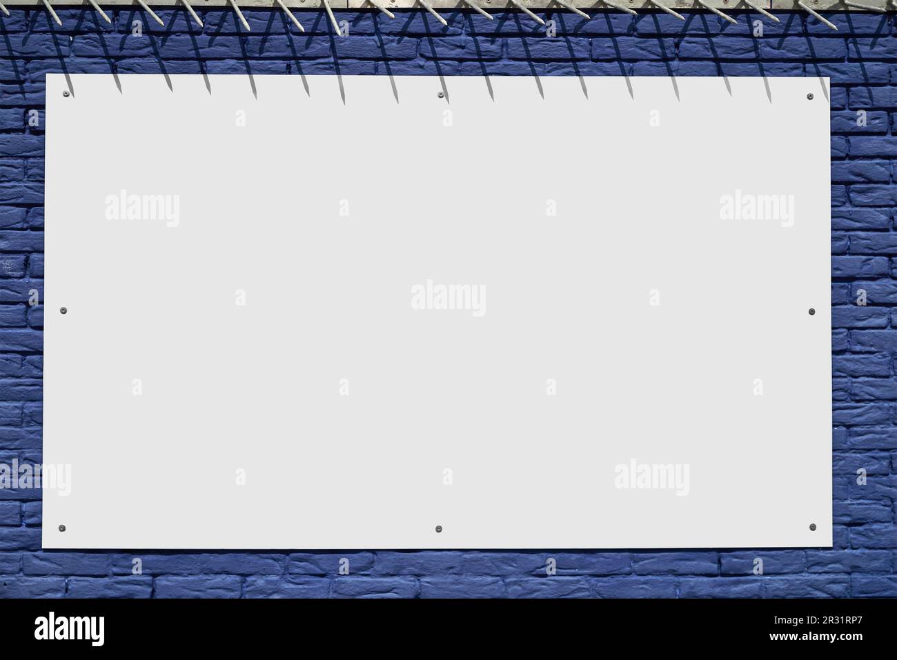 Strukturierte blaue Ziegelwand und blanker Rahmen, ideal für den Hintergrund Stockfoto
