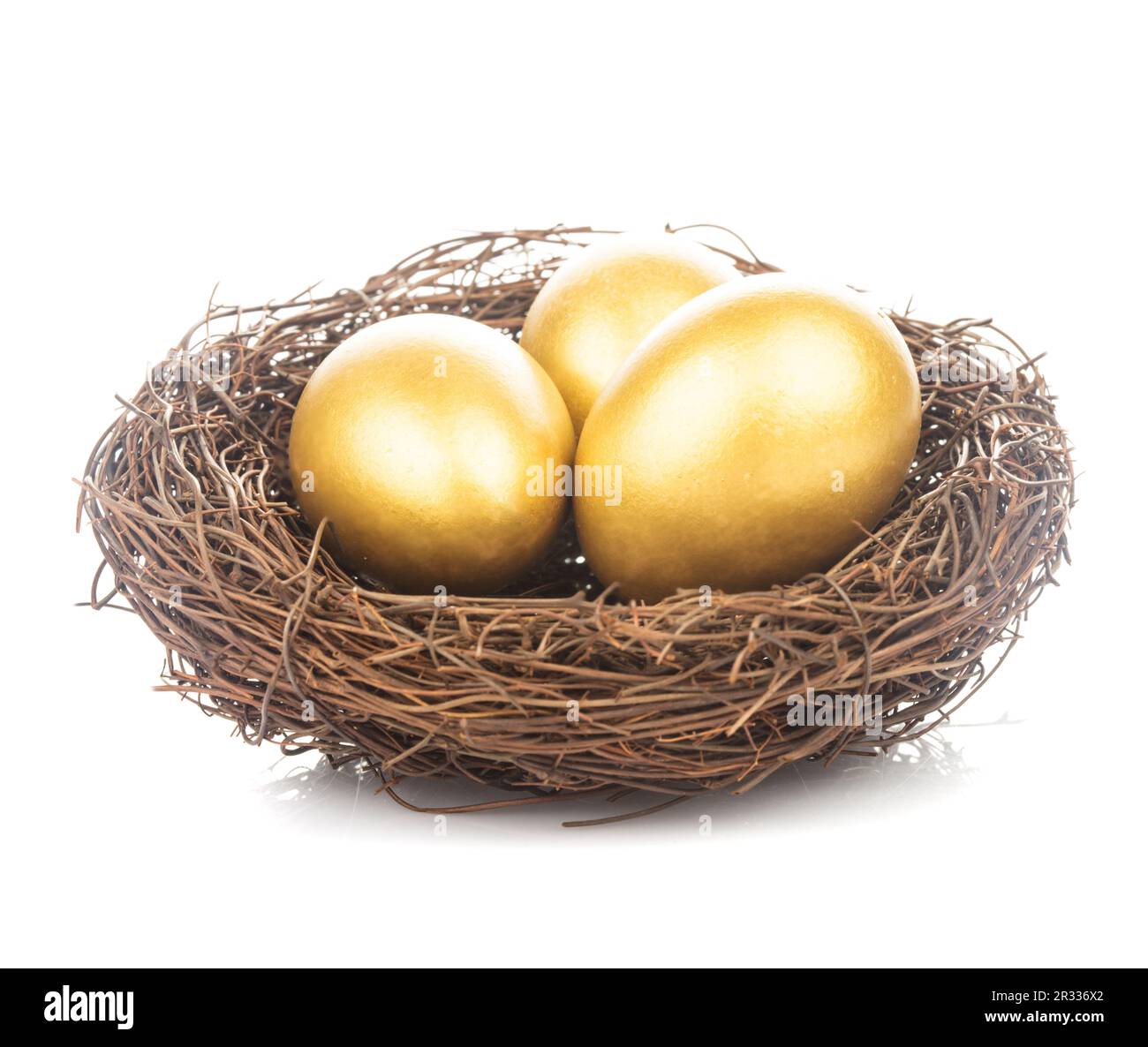 Goldenen Eiern im nest Stockfoto