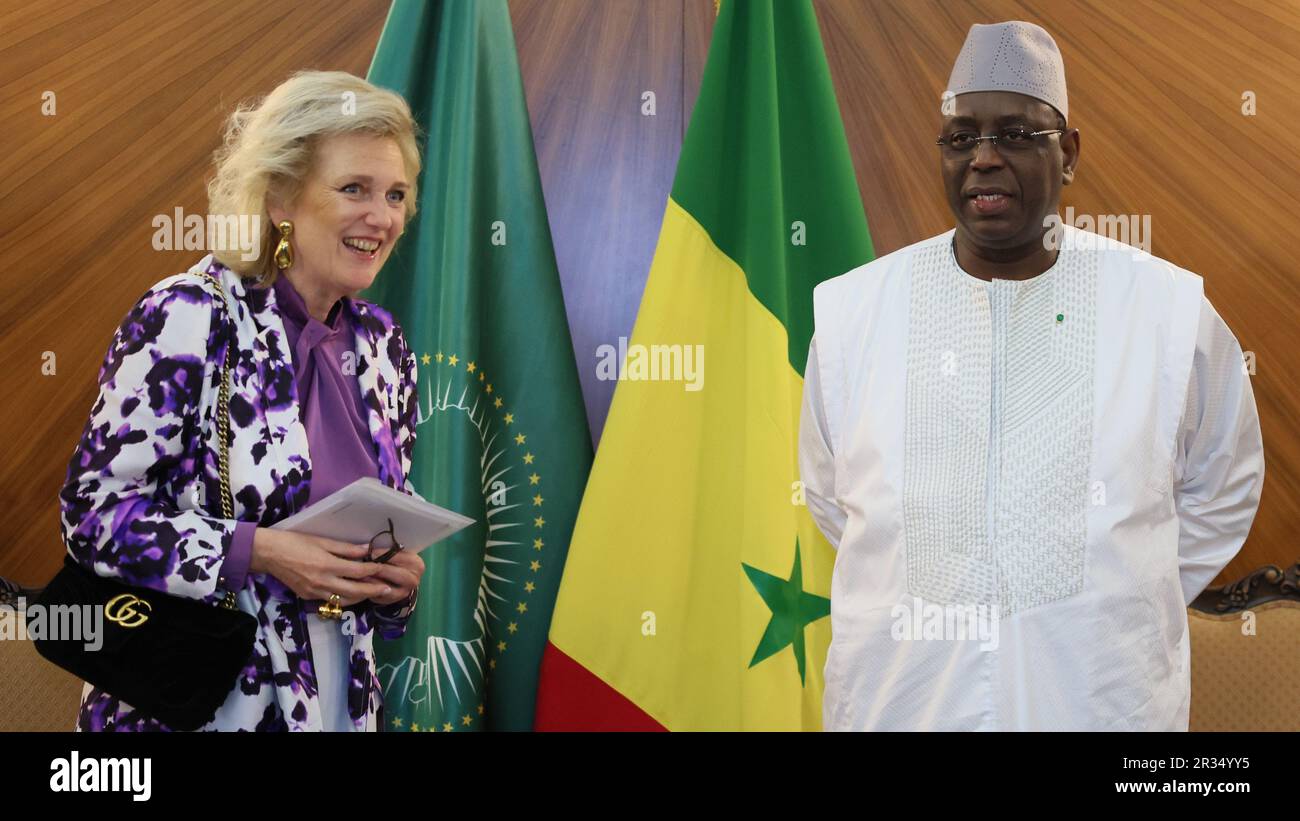 Dakar, Senegal. 22. Mai 2023. Prinzessin Astrid von Belgien und der senegalesische Präsident Macky Sall wurden bei einer Audienz mit dem senegalesischen Präsidenten im Präsidentenpalast am ersten Tag einer Wirtschaftsmission in der republik Senegal am Montag, dem 22. Mai 2023, in Dakar (Senegal) fotografiert. BELGA FOTO BENOIT DOPPAGNE Kredit: Belga News Agency/Alamy Live News Stockfoto