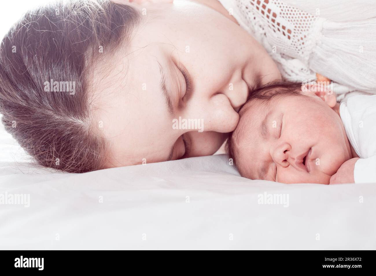 Baby mit Mama Stockfoto