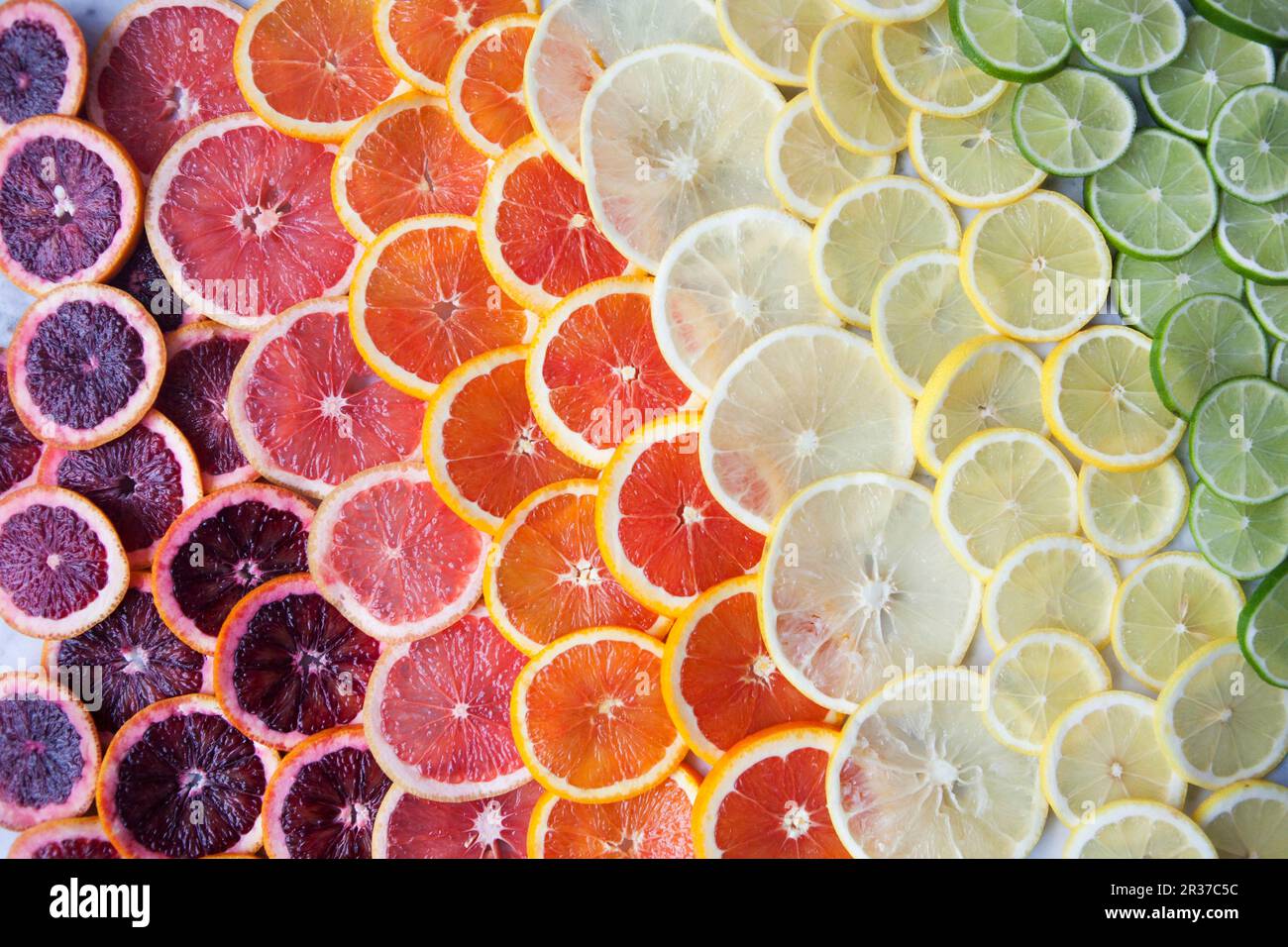 Hell Zitrusfrüchte Schichten in Zeilen farbig Stockfoto