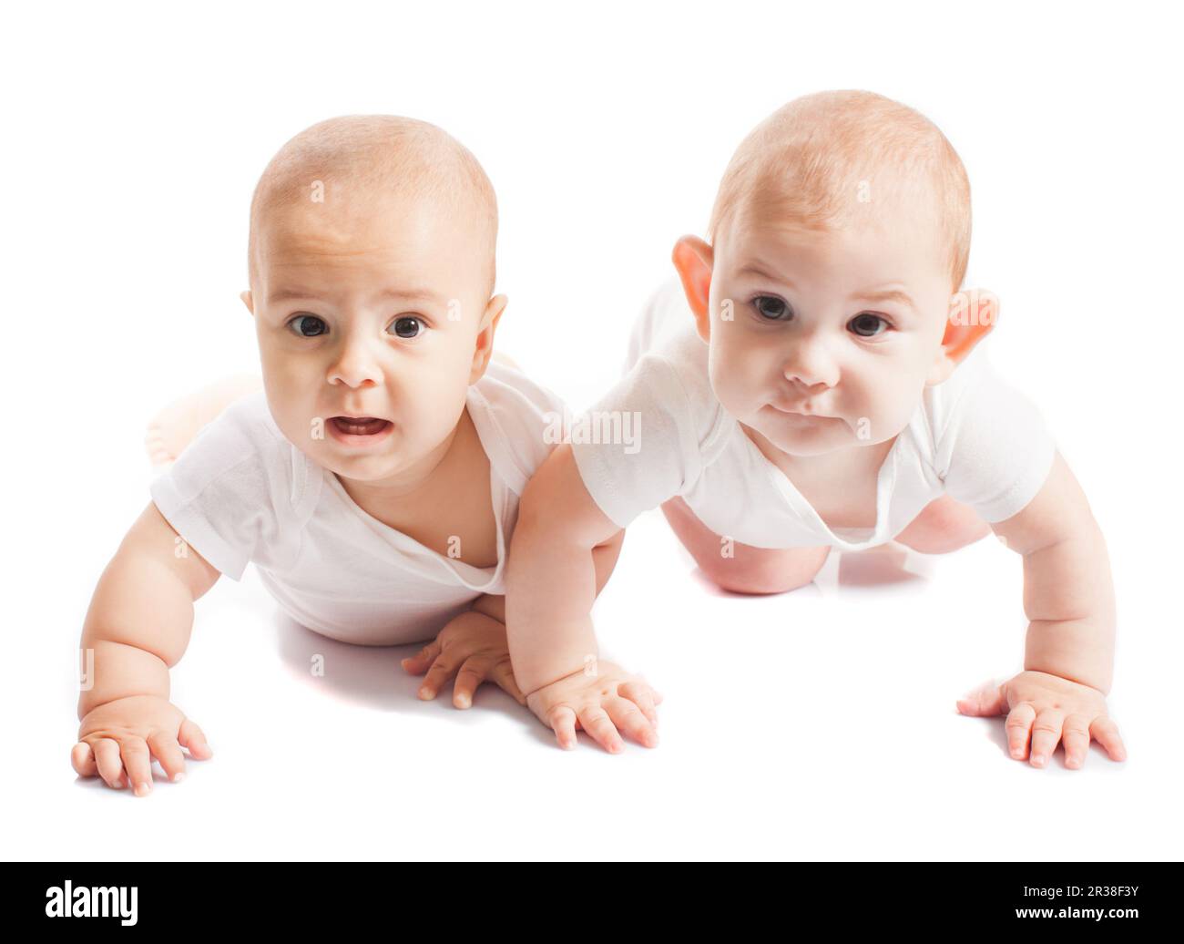 Zwei crawling Zwillinge Stockfoto