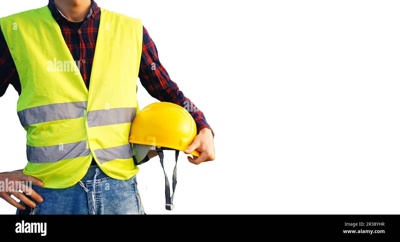 Bauarbeiter mit gelbem Helm. Bauarbeiter in fluoreszierender Weste. Isoliert. Stockfoto