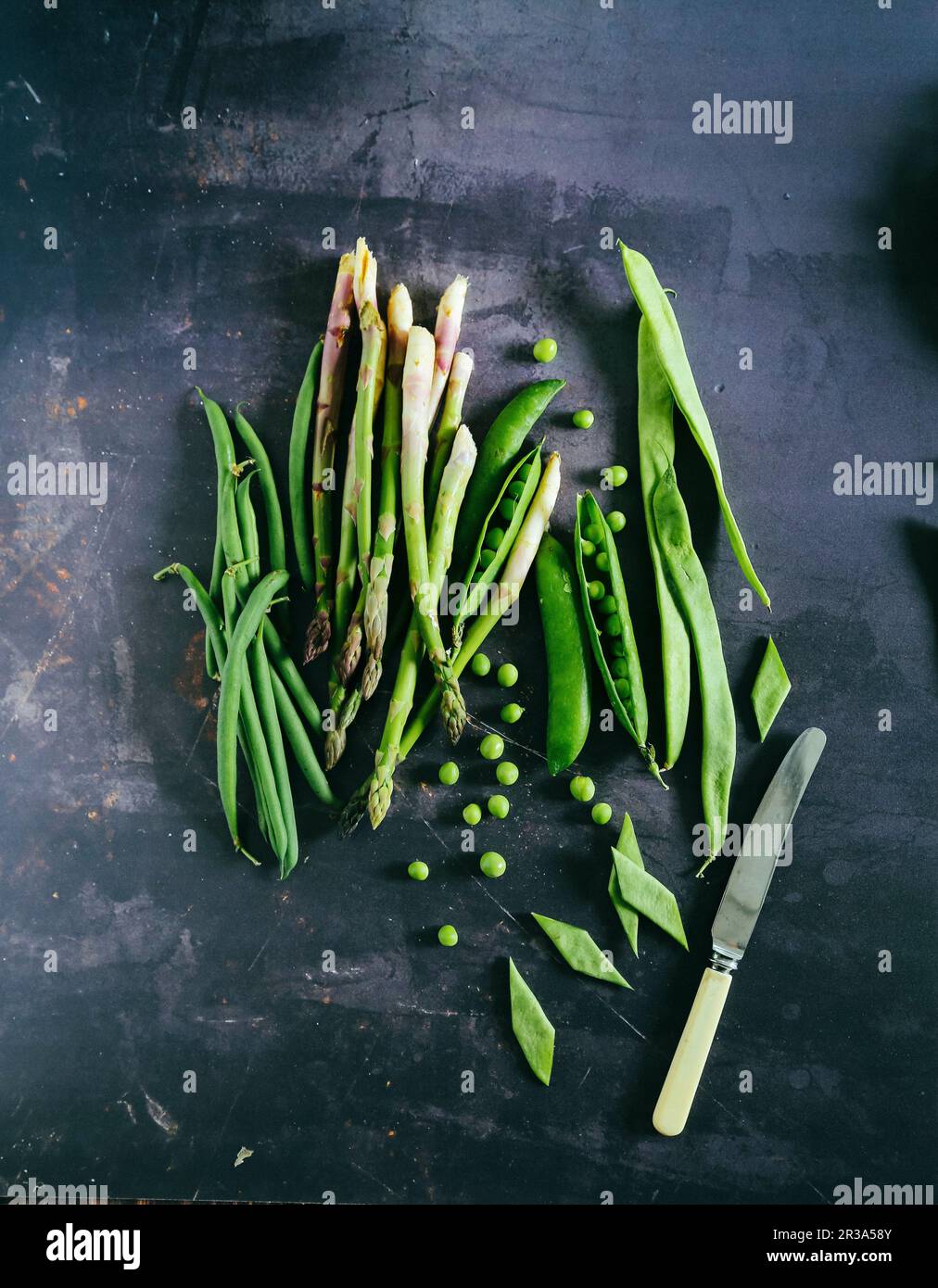 Grüne Bohnen Spargelerbsen und flache Bohnen Taccole Stockfoto