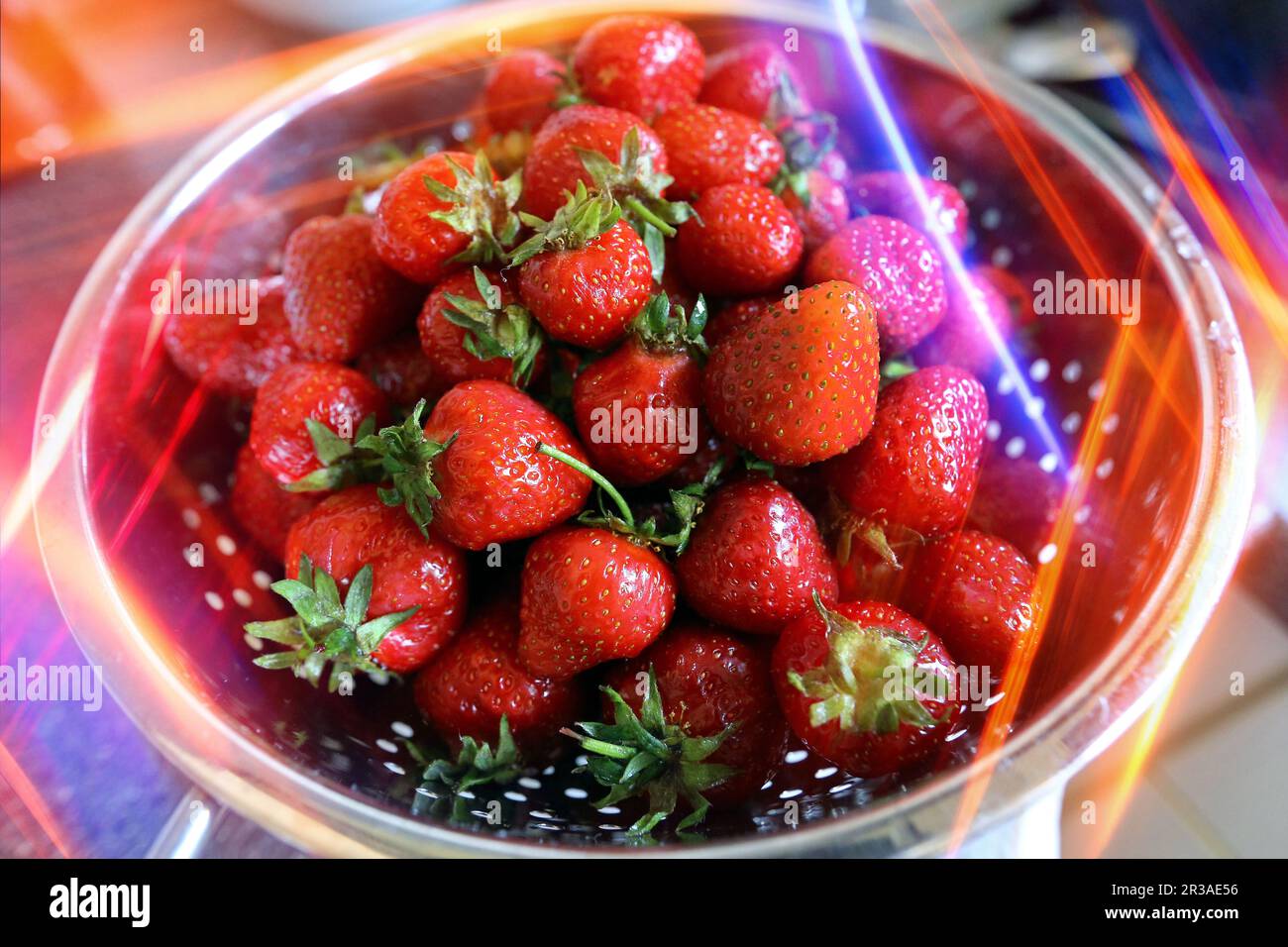 Erdbeeren mit Lichtreflexen Stockfoto