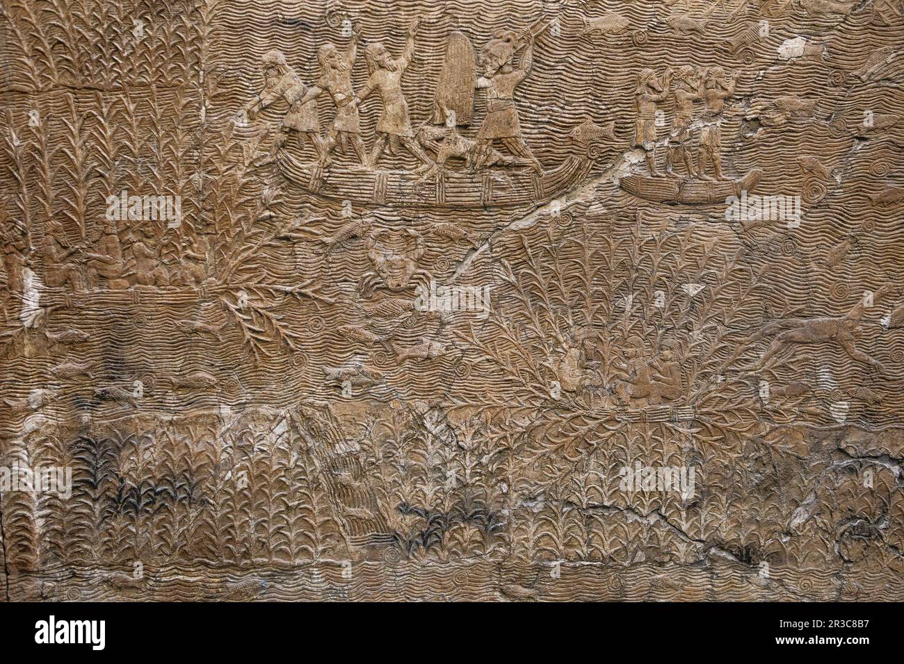 Antike assyrische Steinschnitzerei mit Drehbuch, BRITISH MUSEUM, London, Großbritannien. Wahlkampf in Süd-I Stockfoto