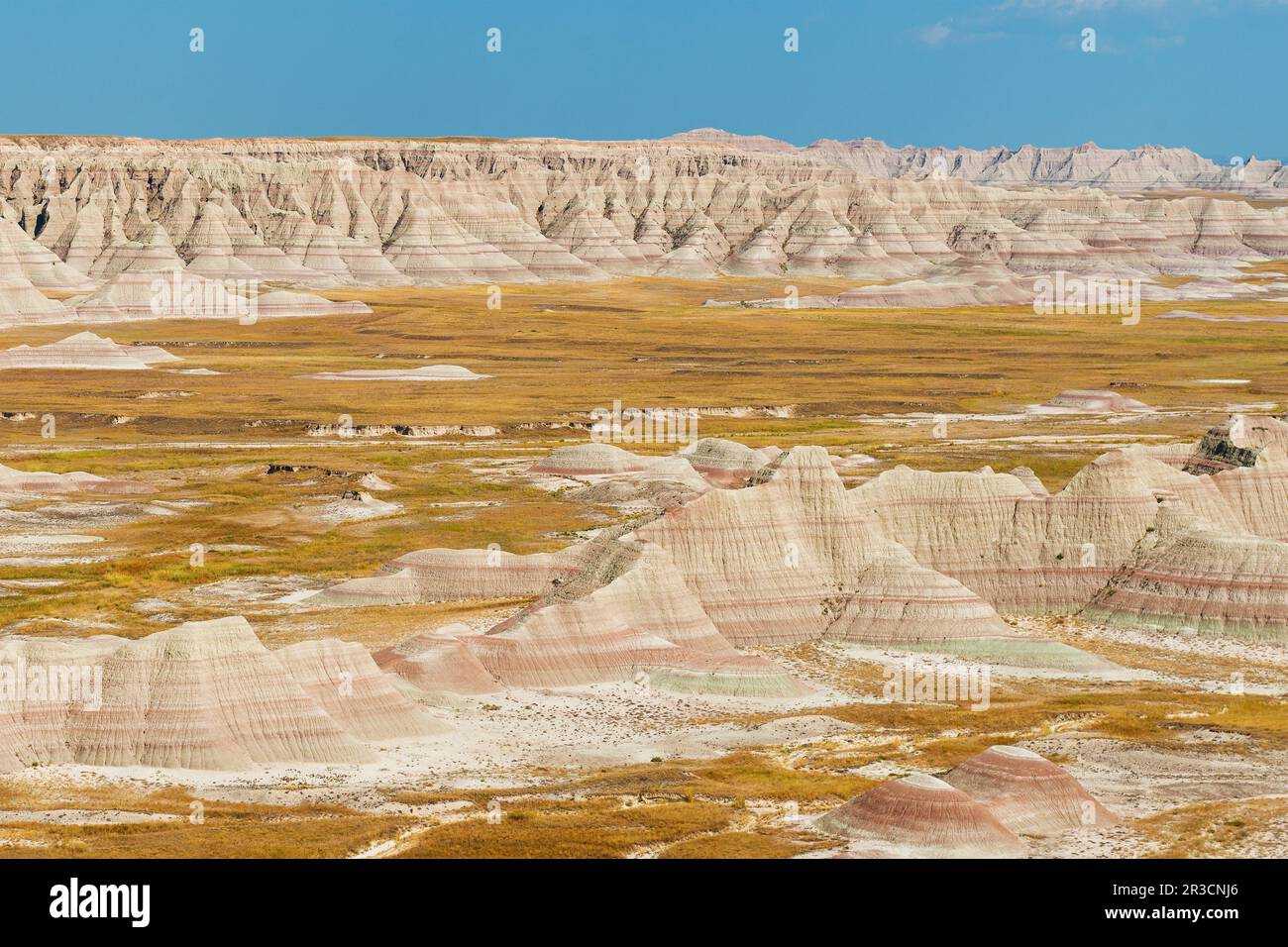 Badlands-Landschaft mit Gesteinsstratifizierung bei Sonnenuntergang, Badlands-Nationalpark, South Dakota, USA. Stockfoto